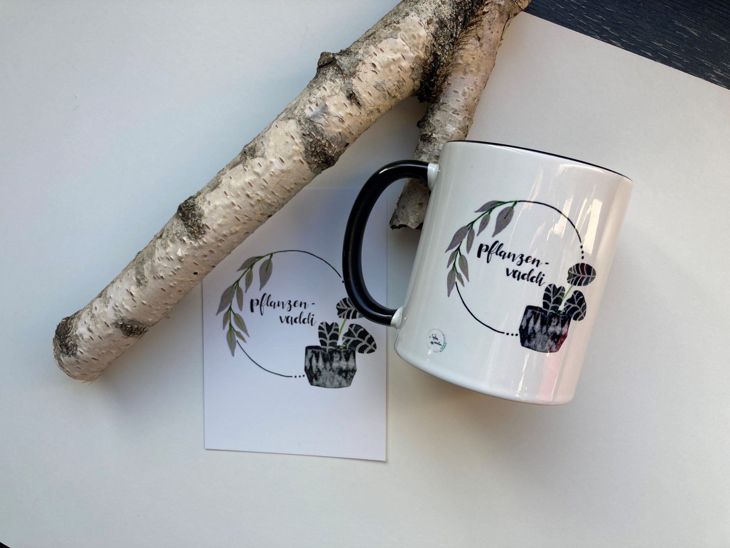 Tasse Pflanzenvaddi mit Karte